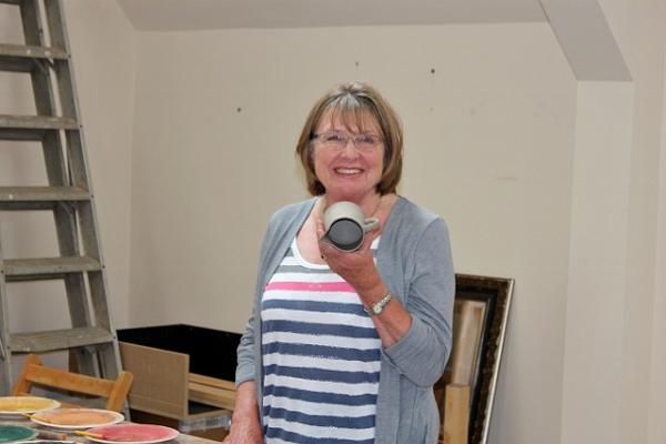 3.  Julie shows the hollow slipware.jpg - Julie shows the hollow slip ware